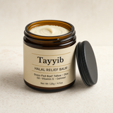Tayyib Halal Relief Balm - amber jar with lid off, showing creamy balm inside